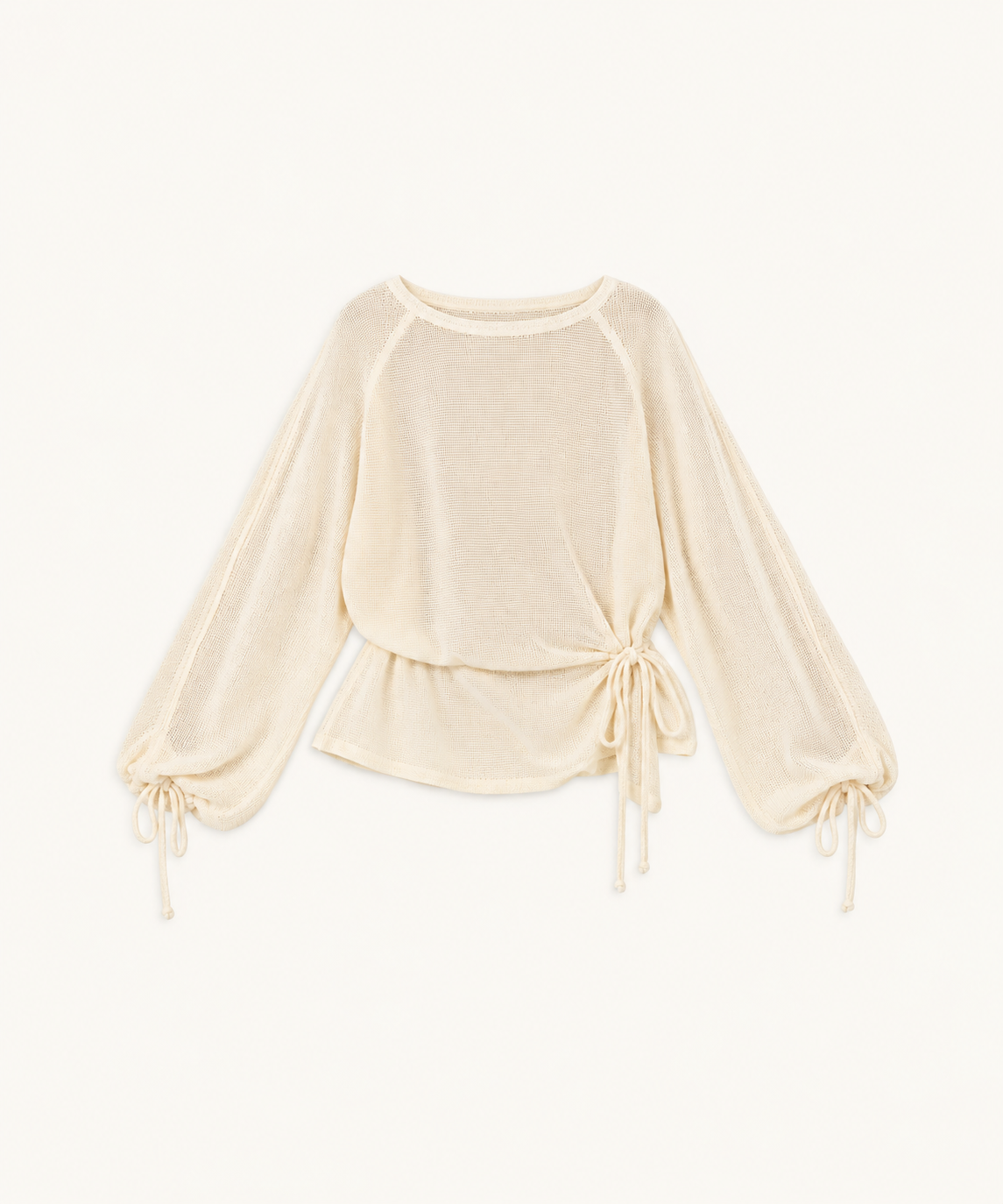 A cream-colored long-sleeve knit top with a crew neck, raglan sleeves, and side tie details on the hem and cuffs, displayed against a solid off-white background.